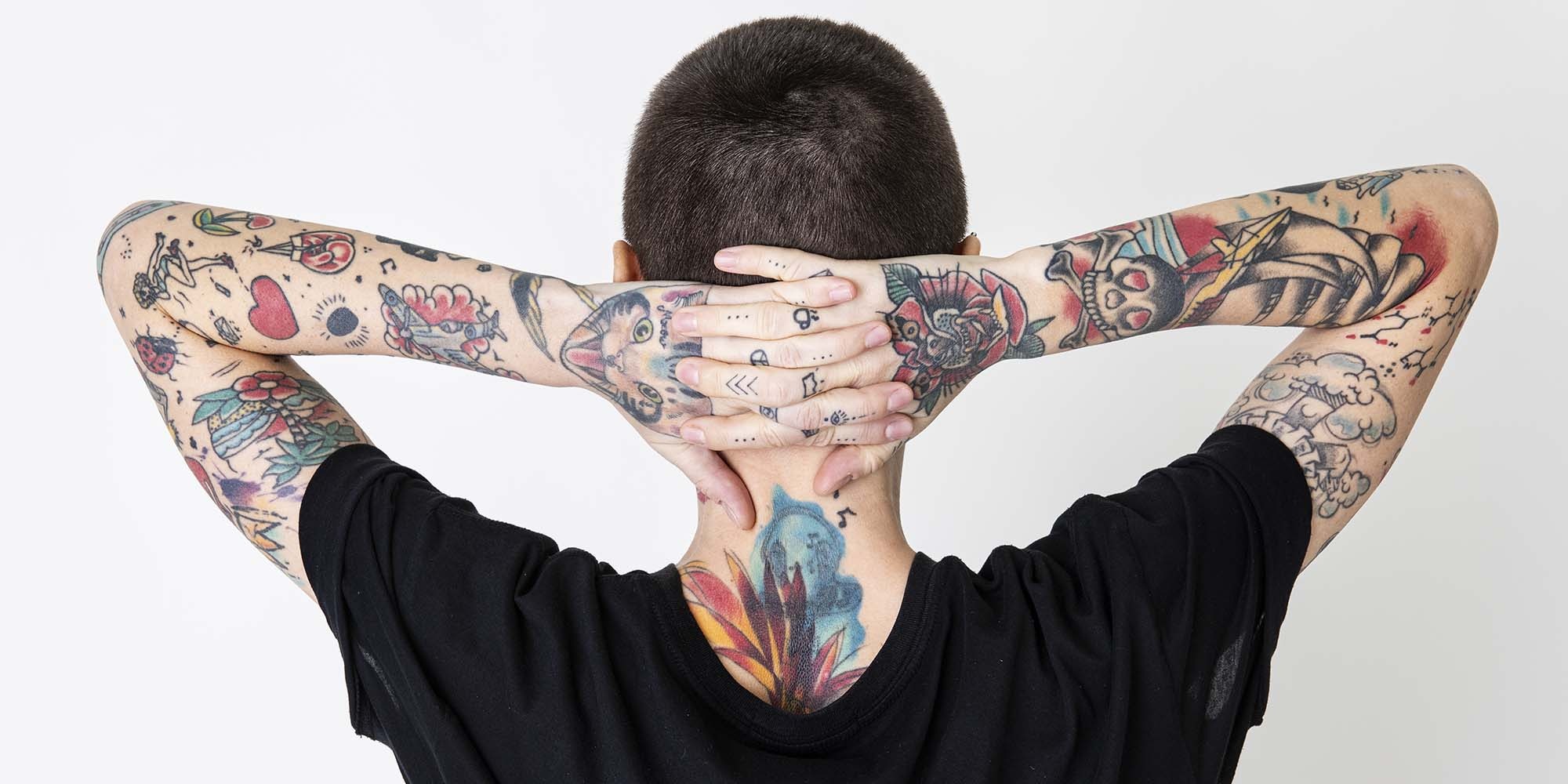 Skinhead tattooed model in black T shirt